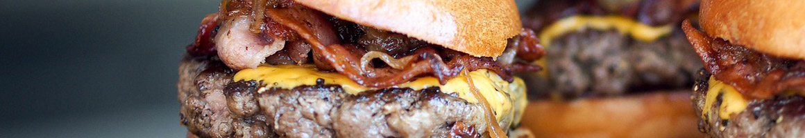 Eating Burger at Bun & Burger restaurant in Westhampton Beach, NY.